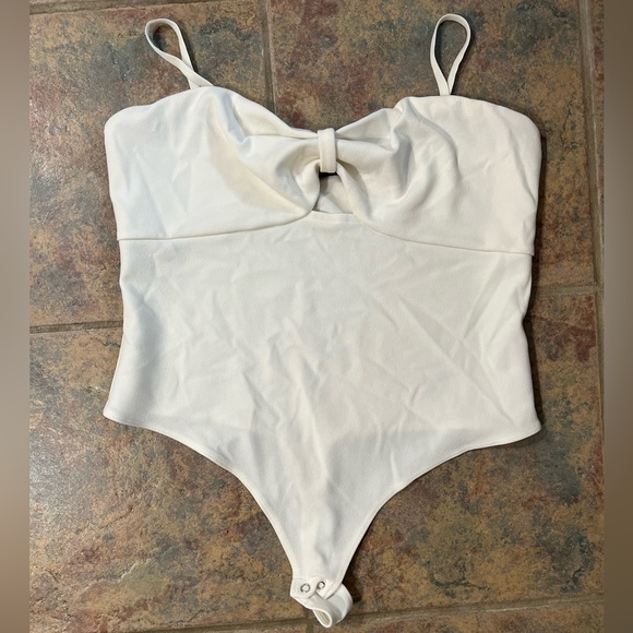 Express Tops - express women’s cream cut-out body suit